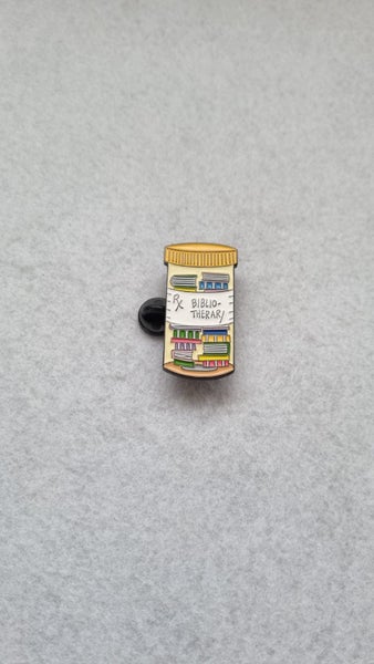 Biblio-Therapy Prescription Bottle Enamel Pin Carousel 1