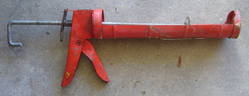 CAULKING GUN Carousel 1