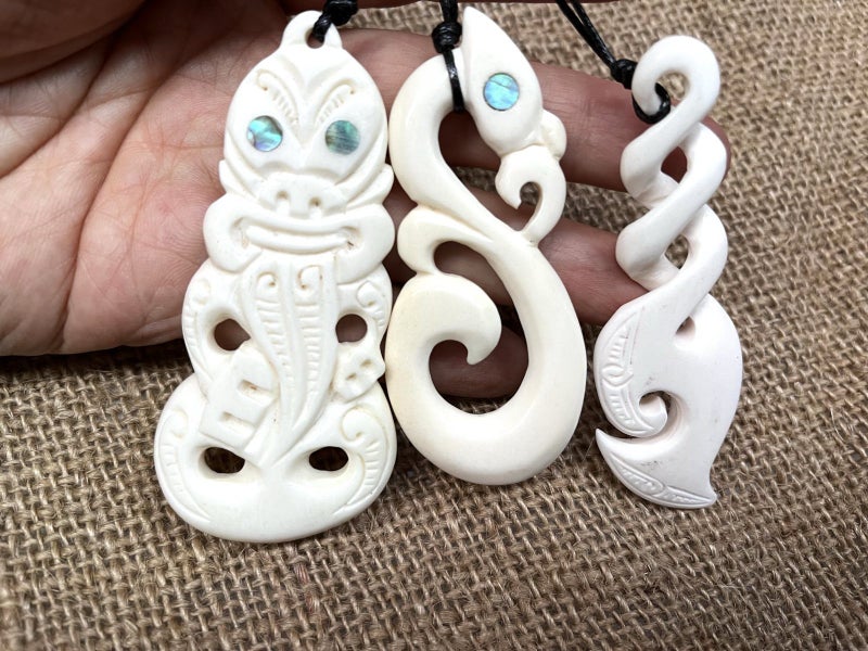 The NZ Classic Bone Carving Pendant Tiki / Twist / Manaia Carousel 1