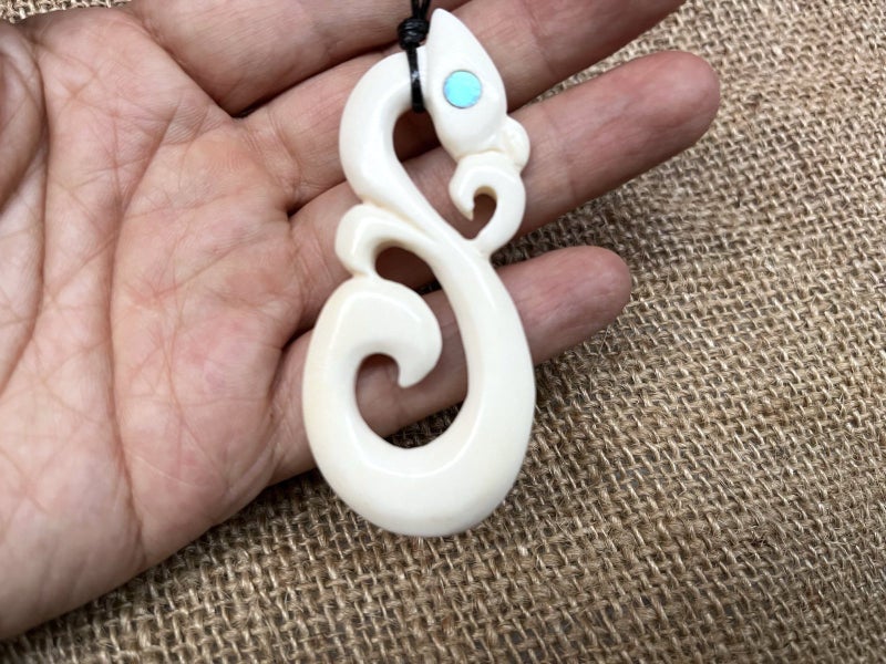 The NZ Classic Bone Carving Pendant Tiki / Twist / Manaia Carousel 1