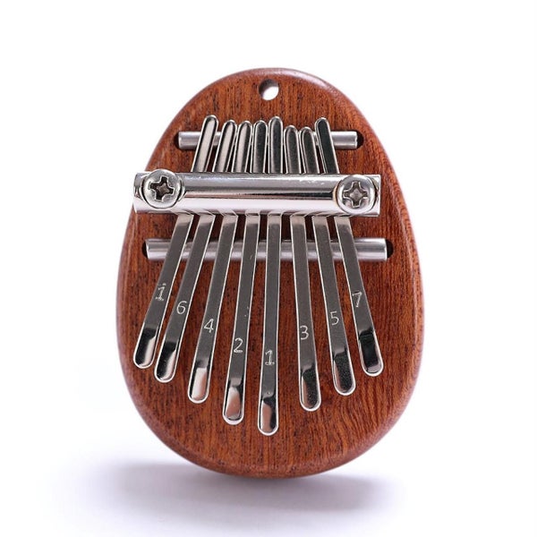 8 Key Mini Ex quisite Finger Thumb Piano Marimba Musical Good Accessory Pendan Carousel 1