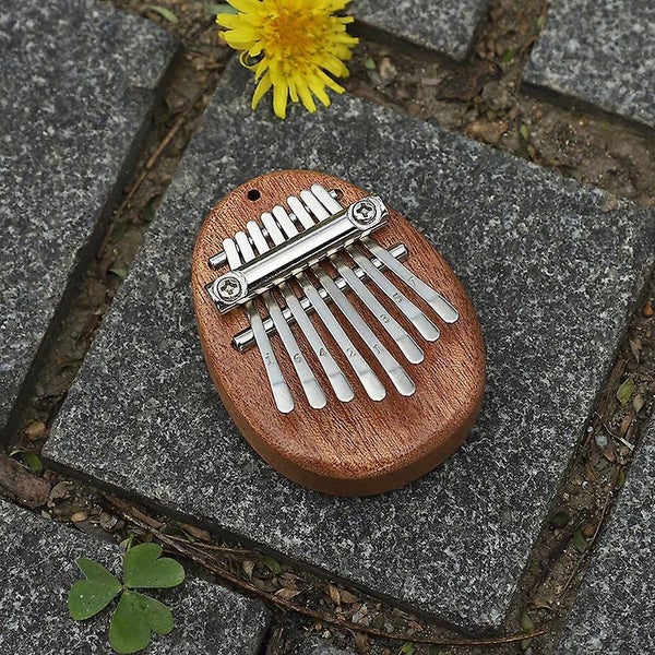 8 Key Mini Ex quisite Finger Thumb Piano Marimba Musical Good Accessory Pendan Carousel 2