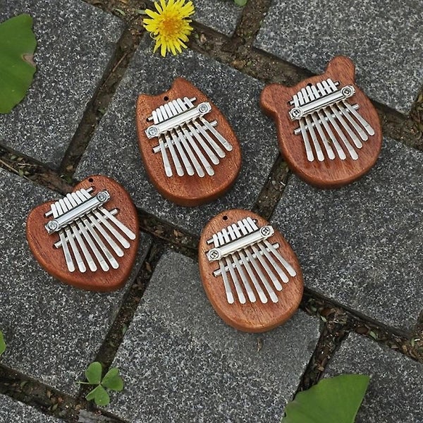 8 Key Mini Ex quisite Finger Thumb Piano Marimba Musical Good Accessory Pendan Carousel 4