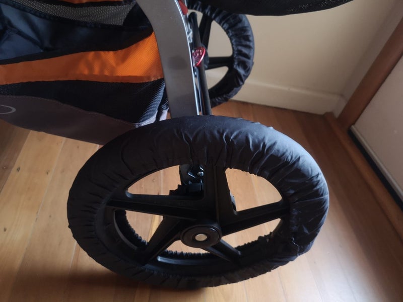 Orange Bob Revolution jogging stroller with accessories Carousel 20