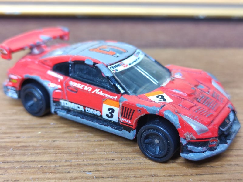 Vintage Tomica Nissan GTR Racing Car No. 50 (2008) 1:64 Scale Carousel 2