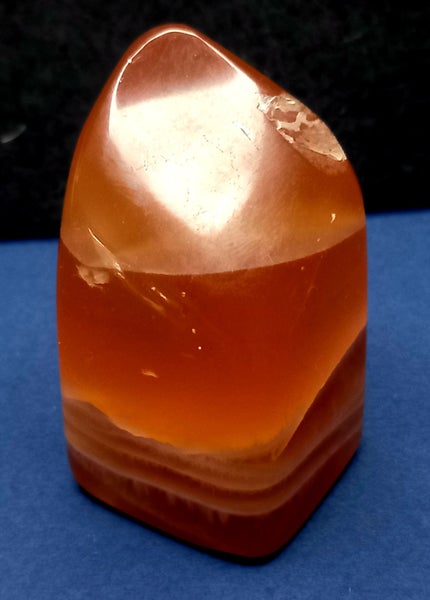 AMBER CALCITE STANDING FREE FORM WITH ORBS Carousel 1