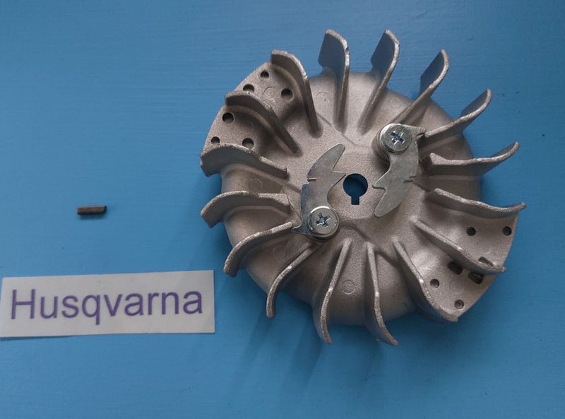 Husqvarna 395XP Flywheel Assembly with Key Carousel 1