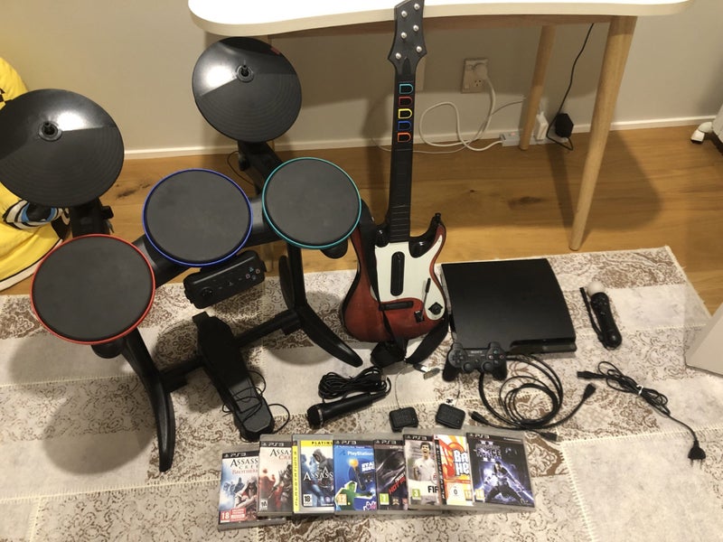 Sony Playstation3 + Band Hero + Move + Games Carousel 1