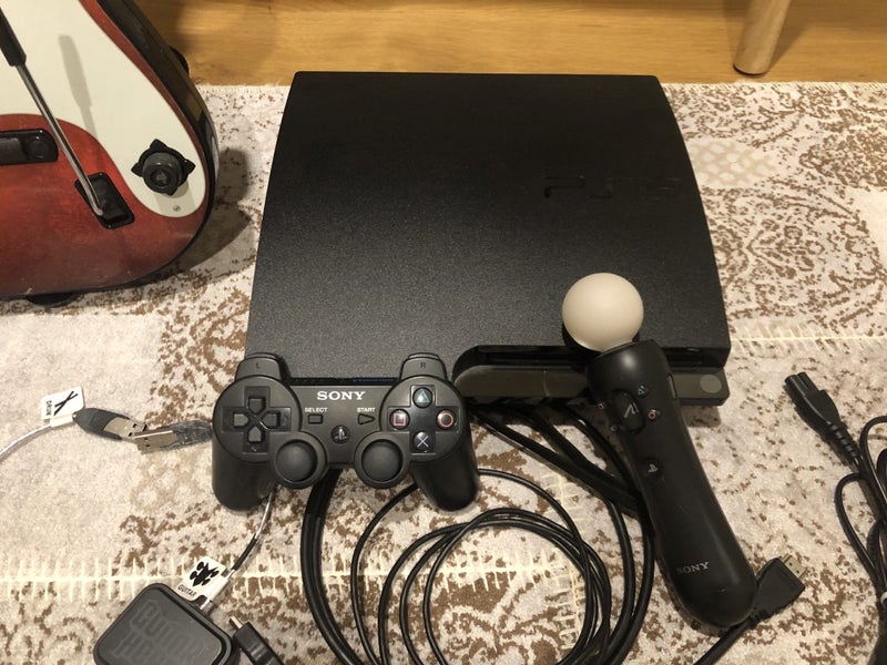 Sony Playstation3 + Band Hero + Move + Games Carousel 6