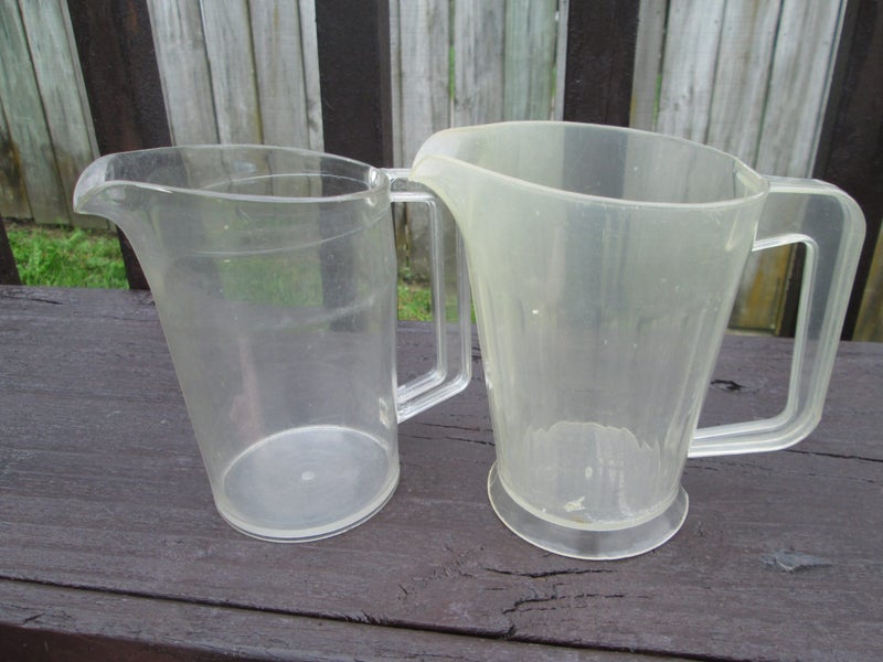 A couple of vintage beer jugs Carousel 1