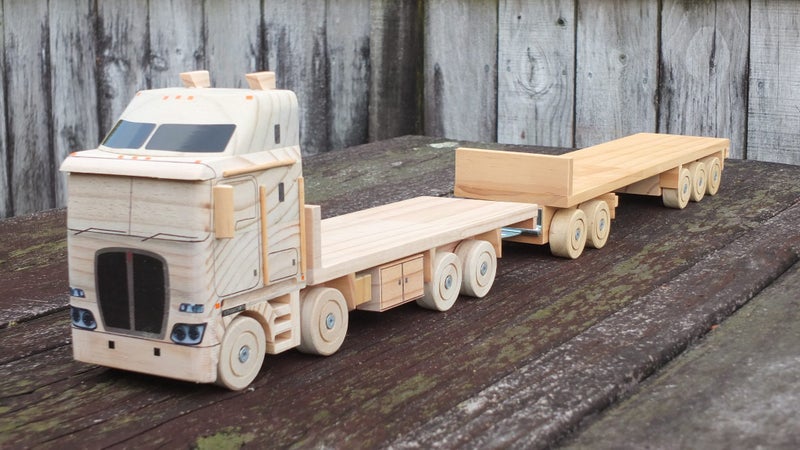kw 8x4 flatdeck and 5 axle trailer Carousel 1