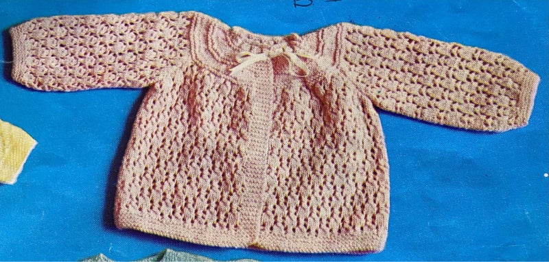HAND KNITTED BRIGHT PINK 4 PLY LACY JACKET. Carousel 3