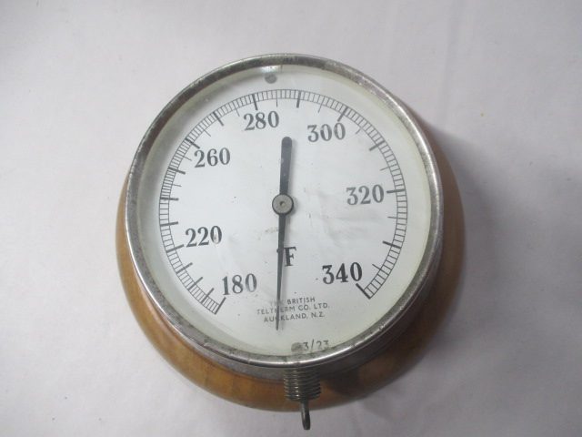 GAUGE NZ TEMP TO 340F. ON TIMBER BASE Carousel 1