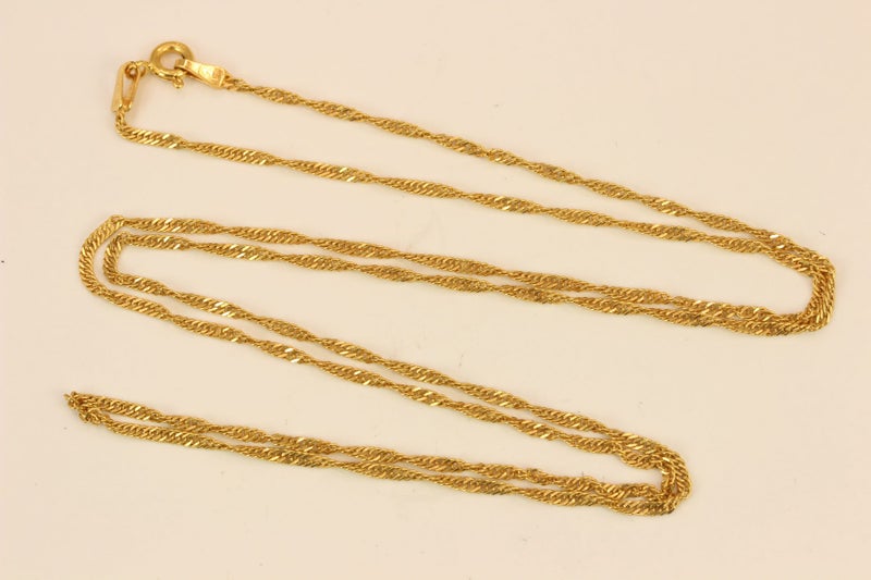 18ct Gold ‘Singapore’ chain Carousel 1