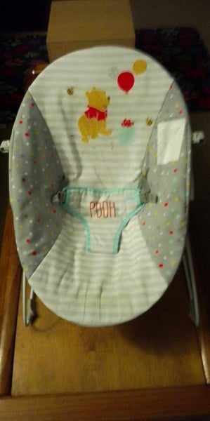 Winnie the pooh vibrating bouncer RRP $120 Carousel 1