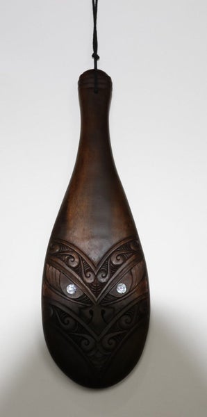 Wooden Patu with Koru Design Carousel 2