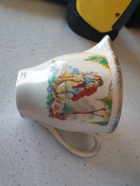 Lovely detailed old jug Carousel 1