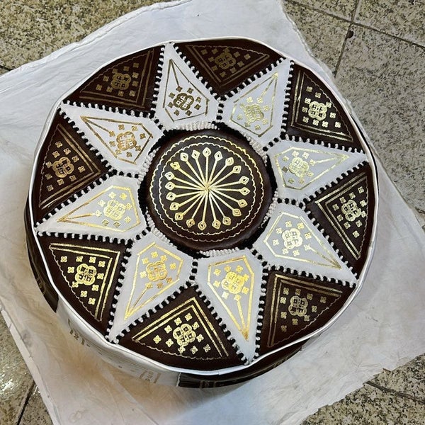 Traditional Moroccan Goatskin Pouffe in Black & White Carousel 1