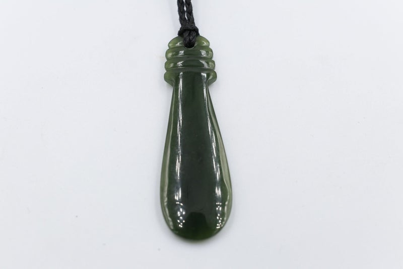 New Zealand Greenstone Polished Mere 65mm Carousel 1