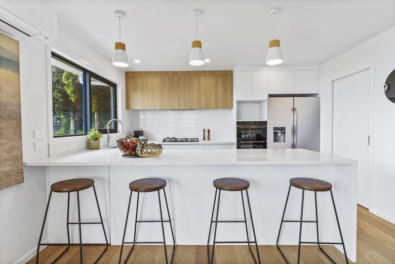 Handle-less Look Kitchen with Engineered Stone Benchtops + Waterfall End Carousel 1
