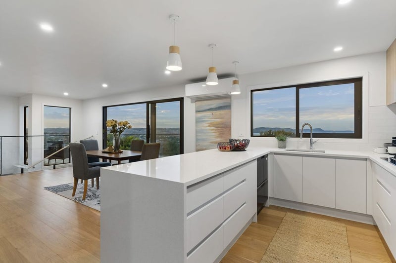 Handle-less Look Kitchen with Engineered Stone Benchtops + Waterfall End Carousel 2