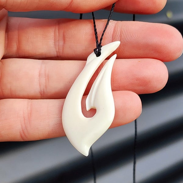 Natural Hand Carved Maori Bone Carving Pendant Necklace - Curved Hook Carousel 2