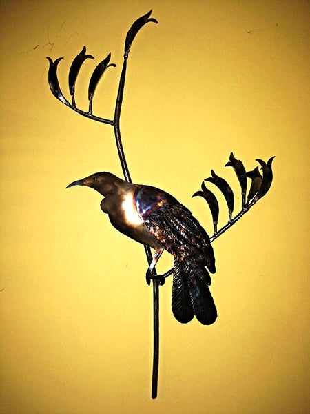 Tui on flax flowers forged by blacksmith Carousel 1
