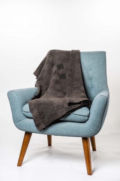 Possum Merino Jacquard Throw Carousel 1