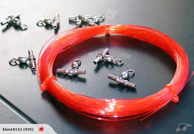 TRACE NYLON - 65lb x 1000m - INVISIBLE (to fish) RED Carousel 2