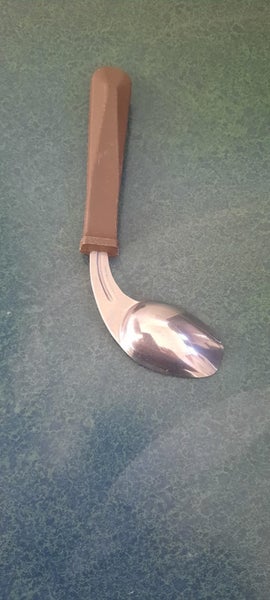 Easy hold curved spoon Carousel 2