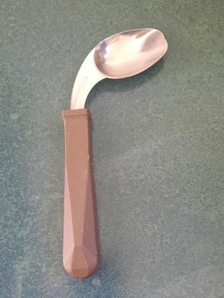 Easy hold curved spoon Carousel 1