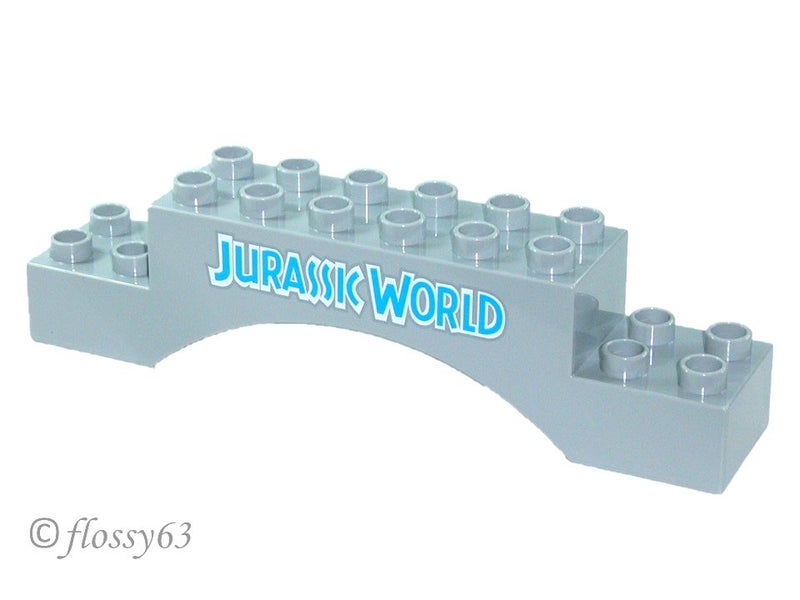 ®™DUPLO - Brick 2 x 10 x 2 Arch with 'JURASSIC WORLD' Pattern ~Retired Dec 2022~ Carousel 1