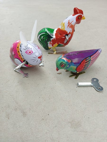 **COLLECTION OF VINTAGE REPRODUCTION TIN WIND UP TOYS** Carousel 1