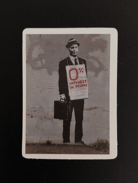 ** BANKSY ART ** 1 x Sticker - ‘0% Interest in People’ (5cm) Carousel 1