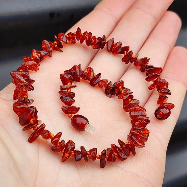 Amber Teething Necklace - Polished Cognac Chip Carousel 1