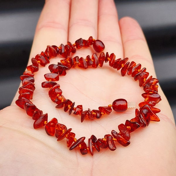 Amber Teething Necklace - Polished Cognac Chip Carousel 2