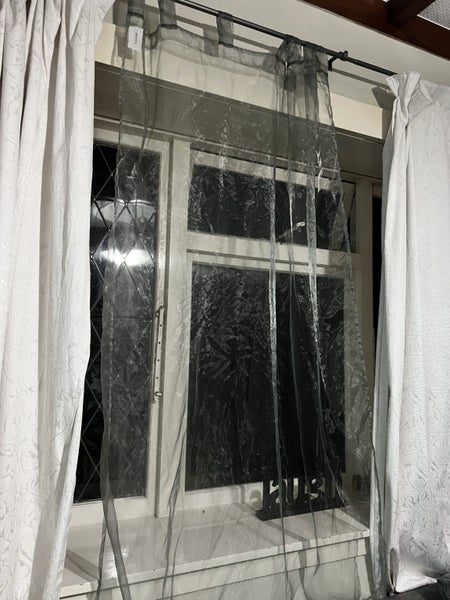 Silver pair of net curtain. Not used Carousel 1
