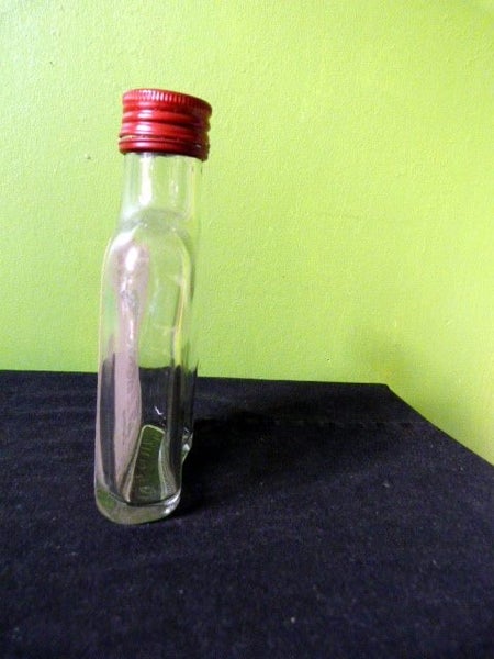 Glass bottle, shaped like a hip flask, 100 ml Carousel 2