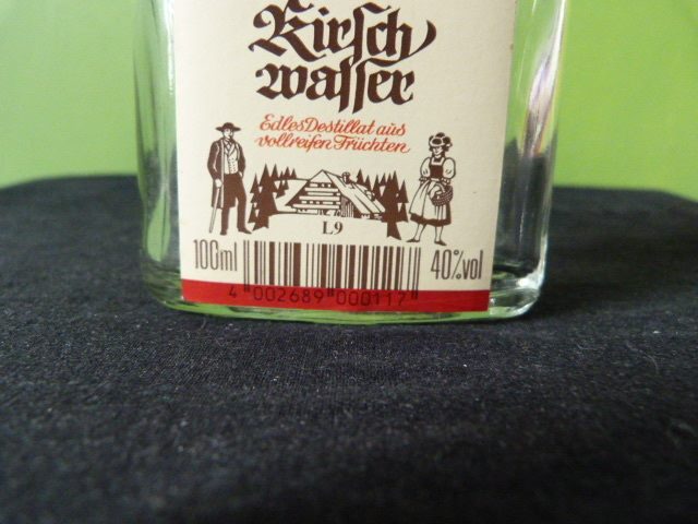 Glass bottle, shaped like a hip flask, 100 ml Carousel 4