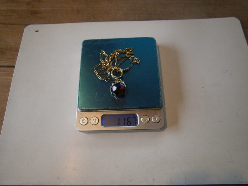 9ct Y.GOLD SPINNER BALL FOB ON 9CT Y. GOLD CHAIN (11.6gms) Carousel 10