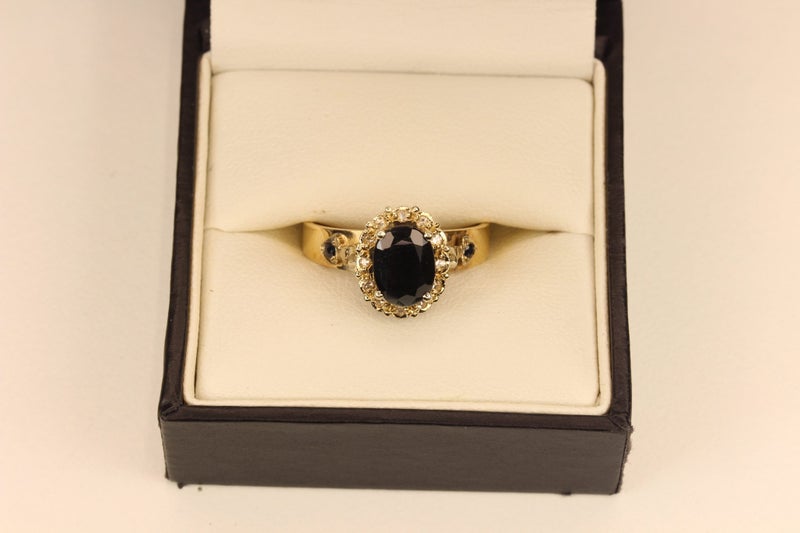 9ct Sapphire & Diamond ‘Halo’ ring Carousel 1