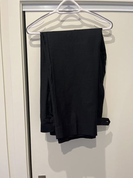 Roman Daniel’s Charcoal Suit Carousel 1