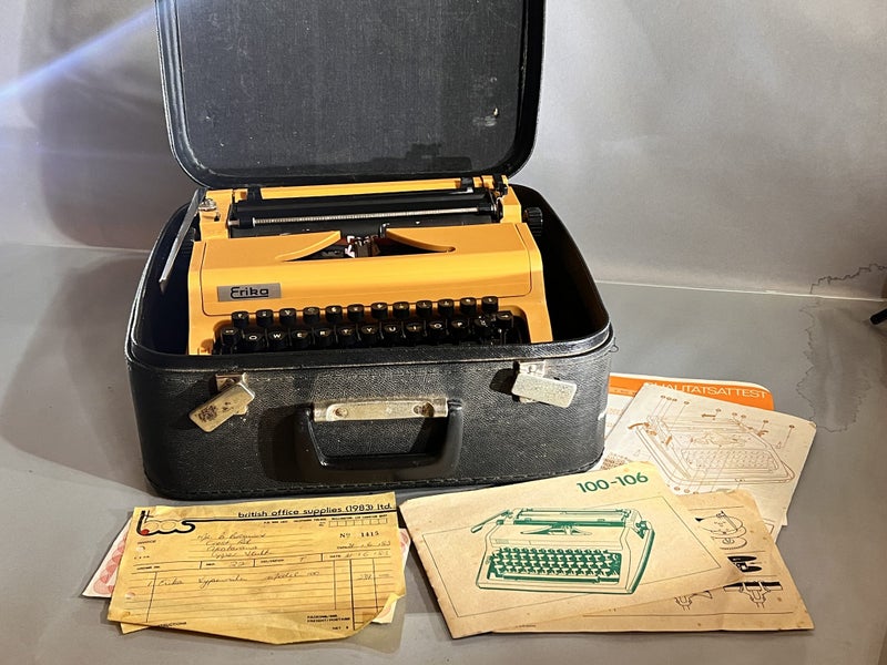 Orange Erika 100-106 Typewriter (1983) - with Case, Instructions & Receipt Carousel 1