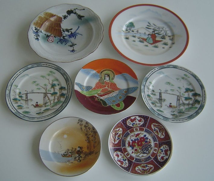 Collection of 7 Oriental Plates For Display Carousel 1
