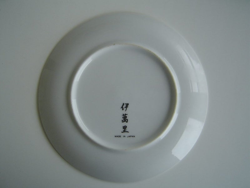 Collection of 7 Oriental Plates For Display Carousel 2