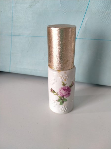 Pretty vintage atomizer perfum bottle with pink rose Carousel 1