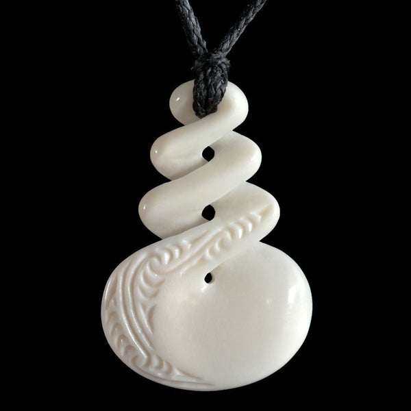 Engraved Triple Twist, handcrafted bone pendant Carousel 1
