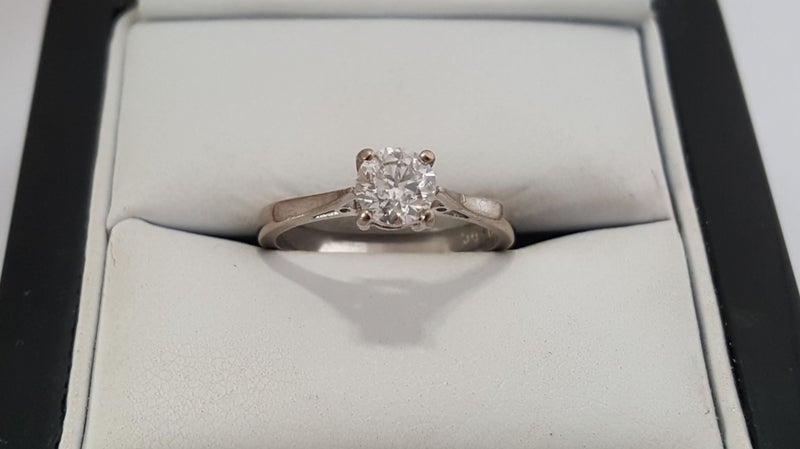 A Classic 18 CT White Gold 0.66 Carat Certified Solitaire Natural Diamond Ring Carousel 1