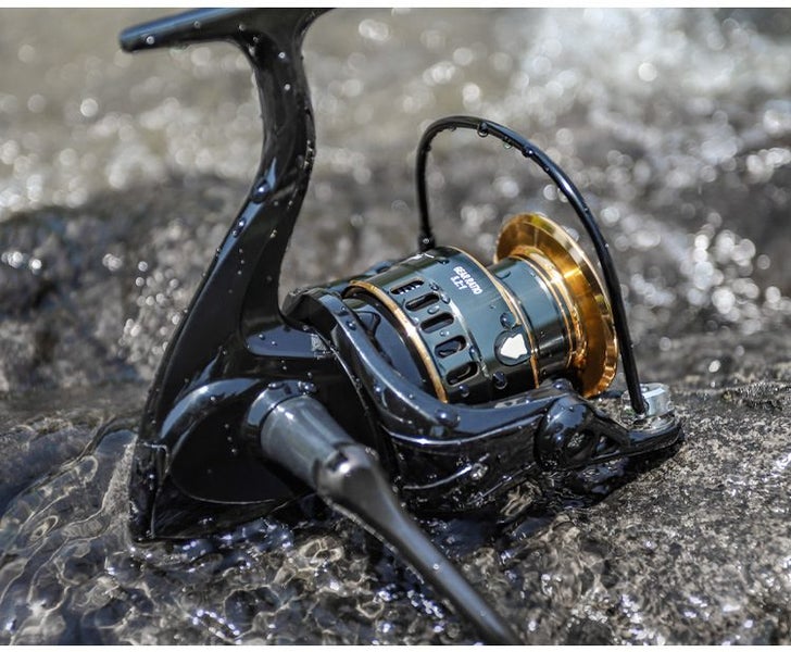 HE7000 Metal Spinning Fishing Reel Left/Right Retrieve 5.2:1 12 Ball Bearings Carousel 2