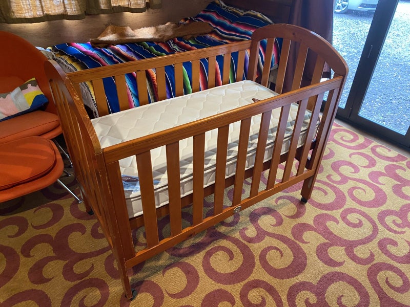 Touchwood cot includes Stokke bumper & sheets Carousel 1